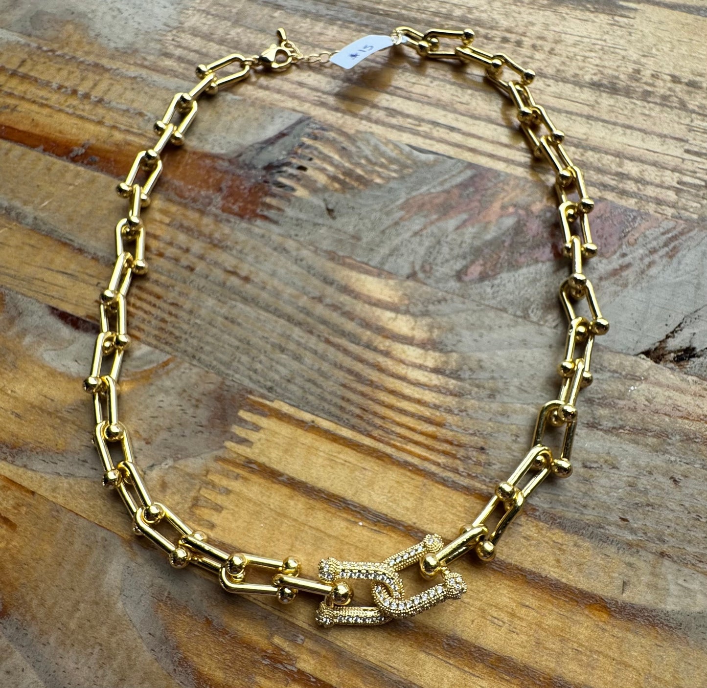 Collar seguros dorado