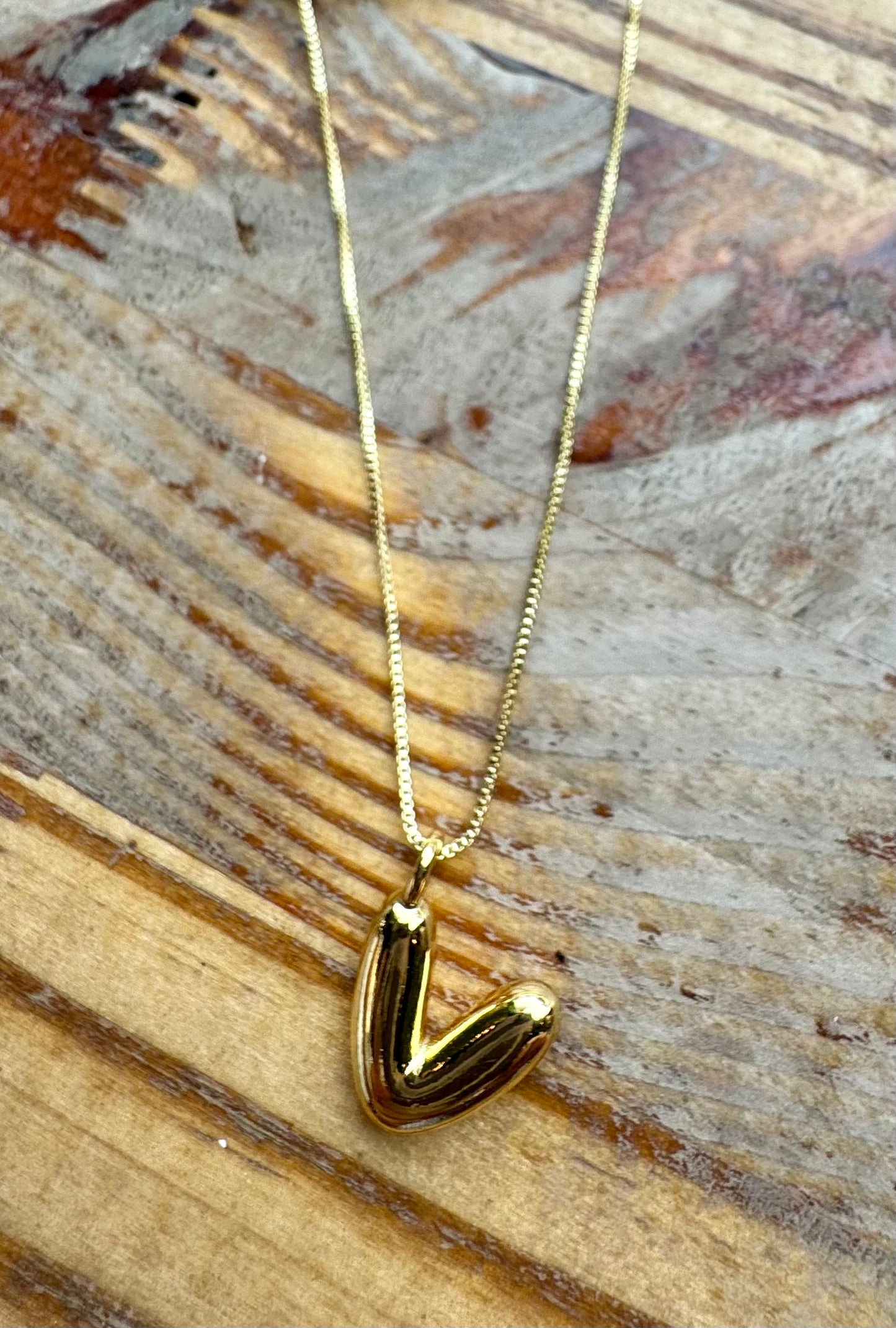 Collar de inicial globo